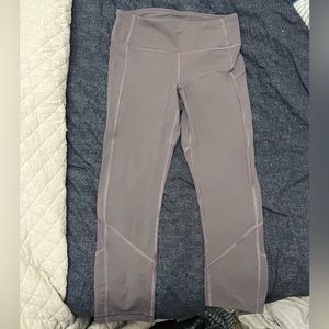 Lululemon size 4 crop leggings with pockets and mesh back section